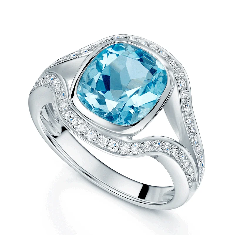 Luxury engagement rings for women-18ct White Gold Cushion Cut Blue Topaz Ring With Diamond Set Split Shoulders