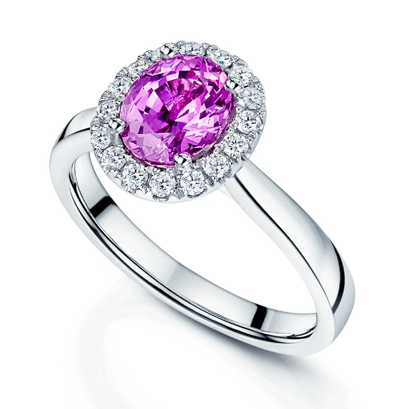 Engagement rings with a vintage feel for women-Platinum Oval Cut Pink Sapphire And Round Brilliant Cut Diamond Halo Ring