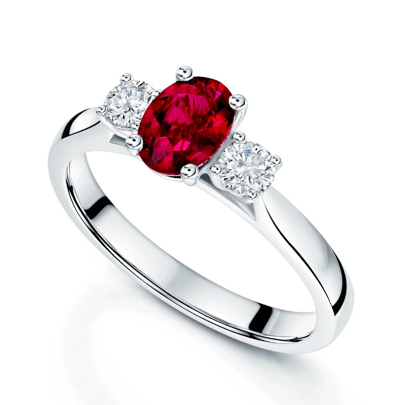 Cushion cut engagement rings for women-Platinum Oval Cut Ruby And Diamond Three Stone Ring