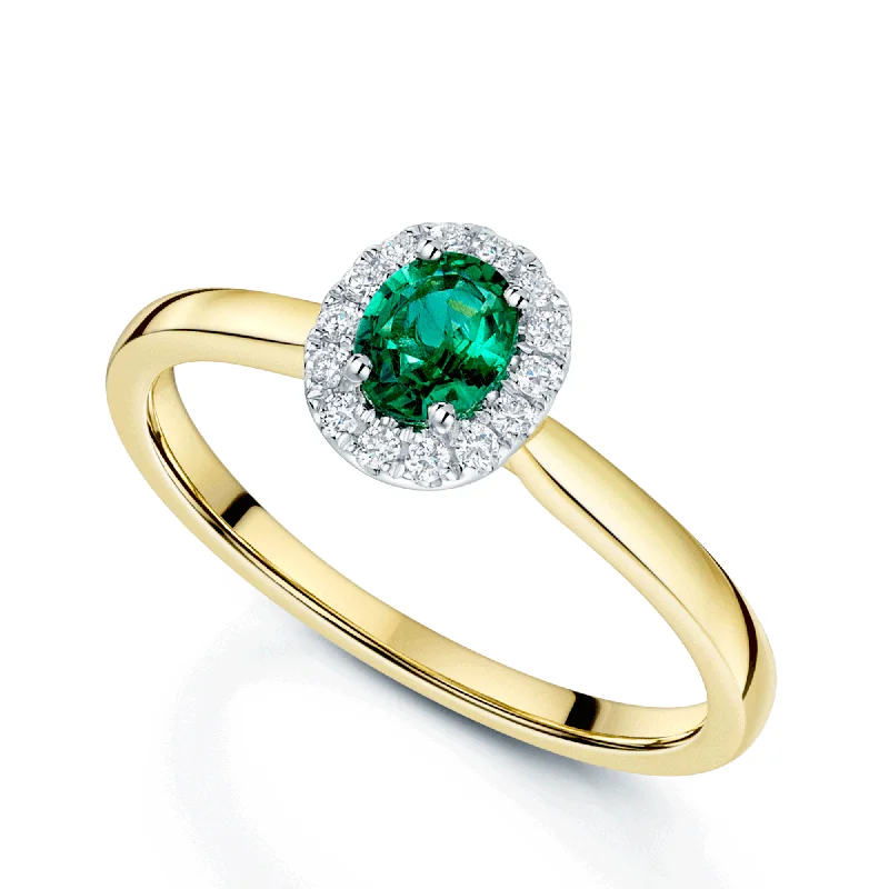 Classic engagement rings for women-18ct Yellow Gold Oval Emerald And Diamond Cluster Ring