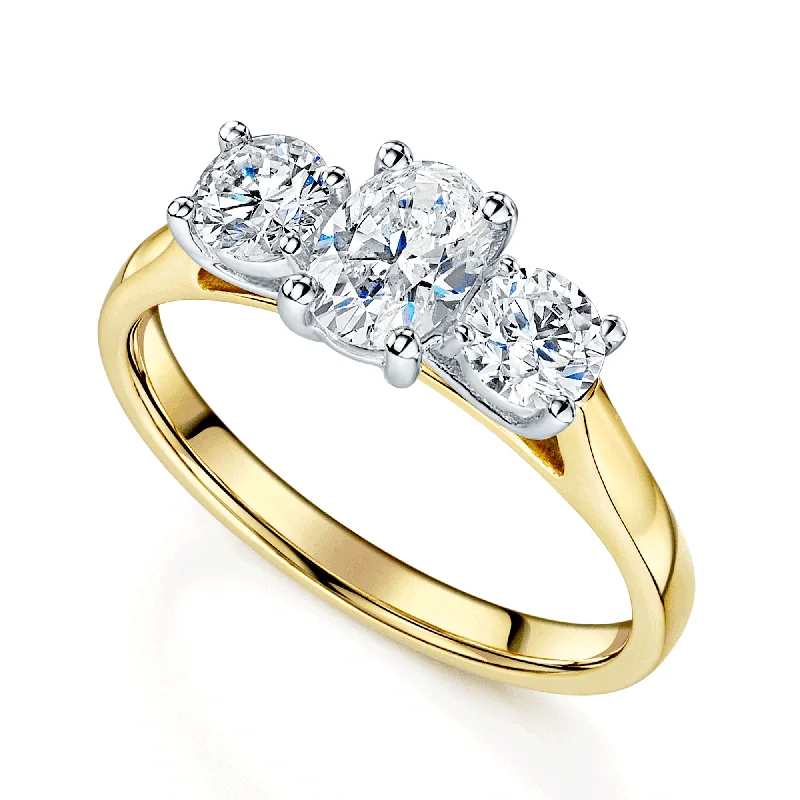 Engagement rings with oval cuts for women-18ct Yellow Gold Oval & Round Brilliant Cut Diamond Three Stone Ring