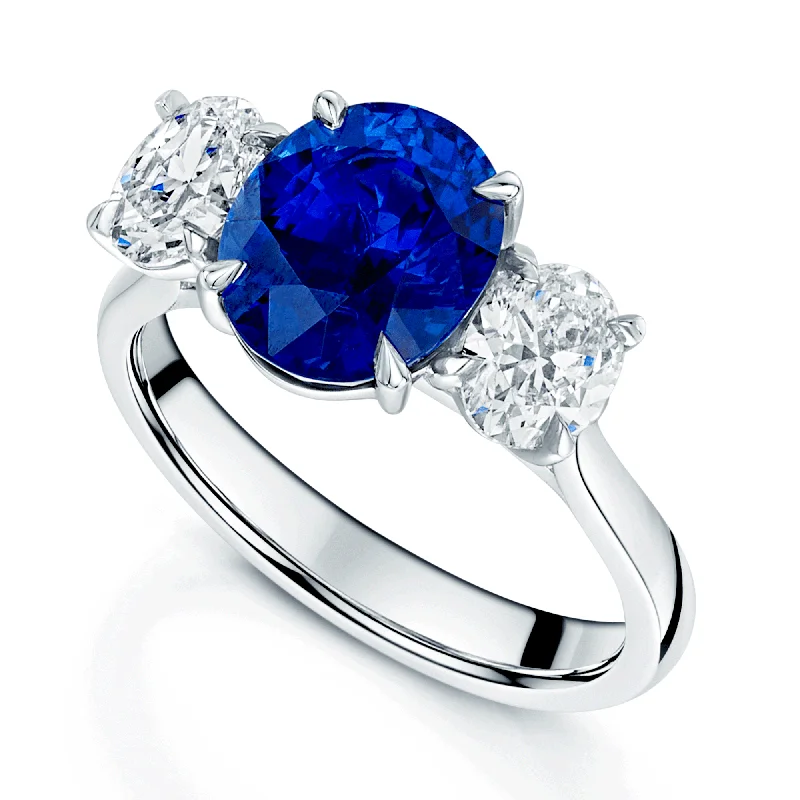 Engagement rings for women with unique diamonds-Platinum Certificated Oval Cut Blue Sapphire And Oval Cut Diamond Three Stone Ring