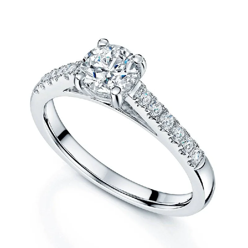 Engagement rings for women with unique diamonds-Platinum GIA Certificated 0.65 Carat Round Brilliant Cut Diamond Solitaire Ring With Diamond Shoulders