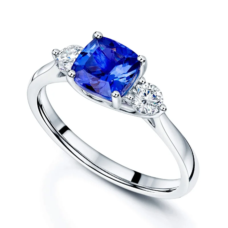 Engagement rings for women with sapphires and diamonds-Platinum Cushion Tanzanite and Round Brilliant Diamond Three Stone Ring