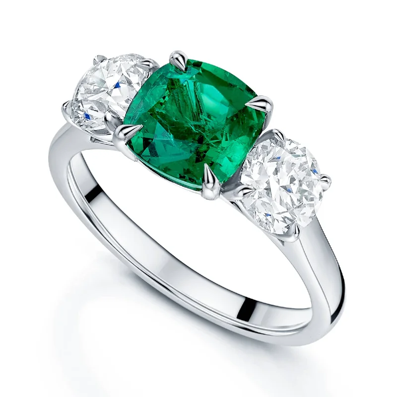 Heart shaped engagement rings for women-Platinum Emerald and Diamond Three Stone Ring