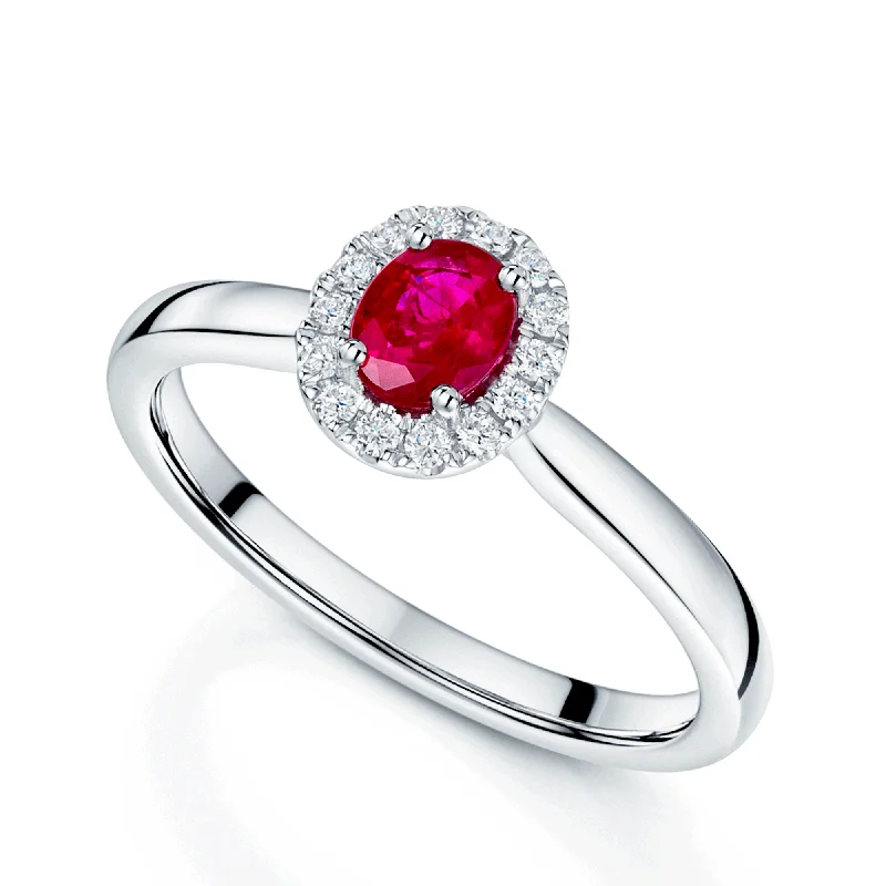 Elegant solitaire engagement rings for women-Platinum Oval Ruby And Diamond Cluster Ring