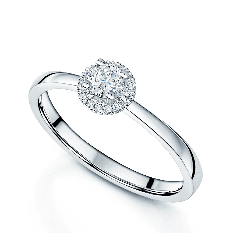 Gold engagement rings with diamonds for women-Platinum Round Brilliant Diamond Halo Surround Ring