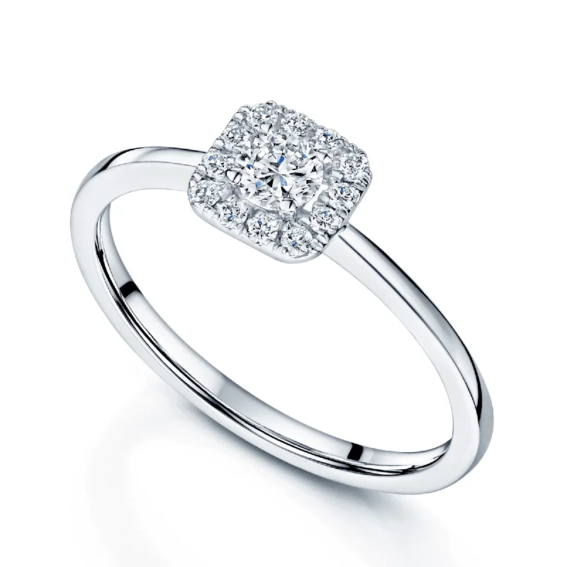 Princess cut engagement rings for women-Platinum Round Brilliant Diamond Halo Ring In A Cushion Shaped Setting