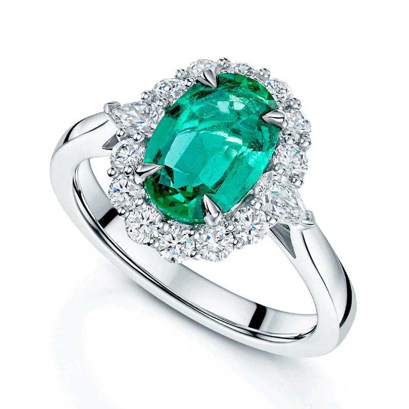 Custom made engagement rings for women-Platinum Oval Cut Emerald And Diamond Halo Cluster Ring