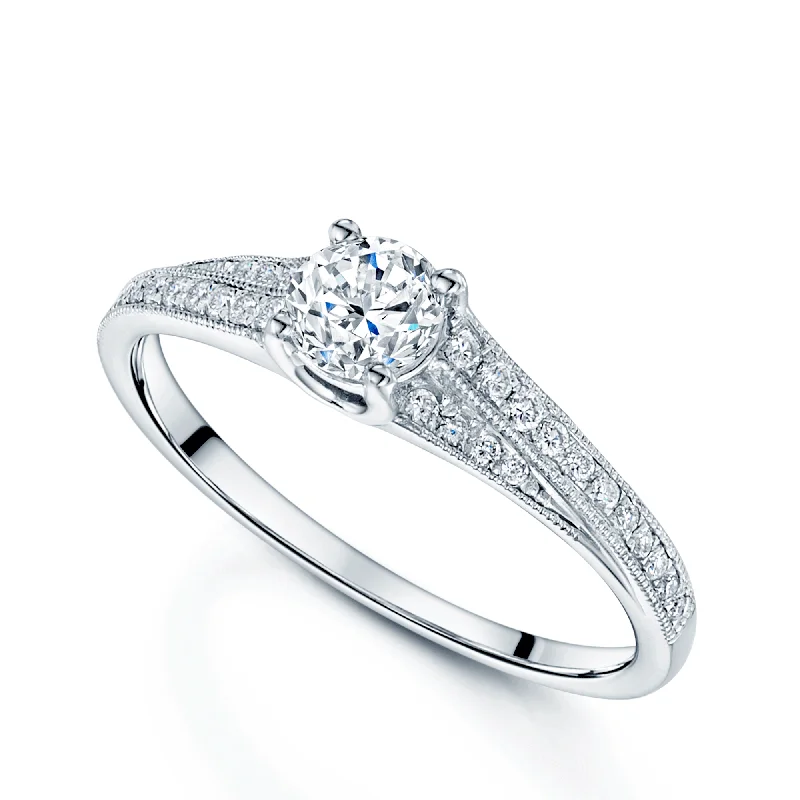 Engagement rings for women with vintage details-Platinum Round Brilliant Cut 0.30 Carat Diamond Claw Set Ring With Diamond Shoulders With Millgrain Edges