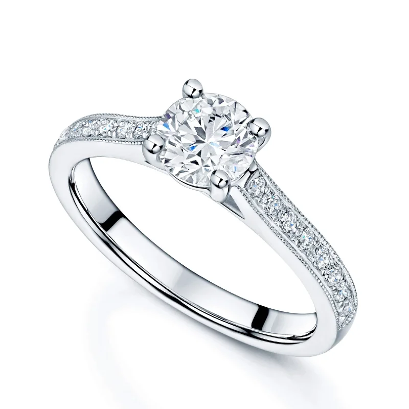 Engagement rings with a modern twist for women-Platinum GIA Certificated Round Brilliant Cut Solitaire Ring With Diamond Set Shoulders