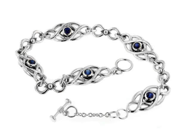 Two-tone bangle bracelet for women-Sterling Silver Dark Blue Sapphire Celtic Knot Bracelet, 7.5"